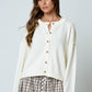 Escalade Raw Edge Exposed Seam Button Down Knit Cardigan