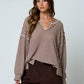 Pepper Stripe Split Neck Long Sleeve Seam Detail Knit Top