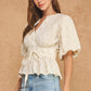 Somerset Dotted Textured Puff Sleeve Tie Waist Peplum Top