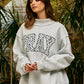 PRAY Embroidered Mock Neck Sweatshirt