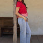 Paducah Ruffle Frill Asymmetric Hem Mixed Media Knit Tee Top