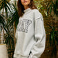 PRAY Embroidered Mock Neck Sweatshirt