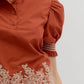 Arthur Solid Embroidered Smocked Cuff Band Short Sleeve Blouse